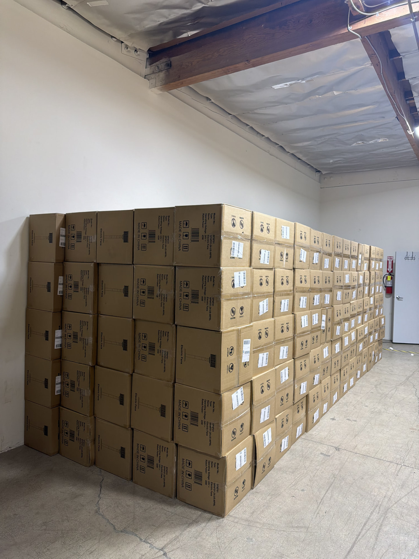 Rows of product cartons stacked in the warehouse